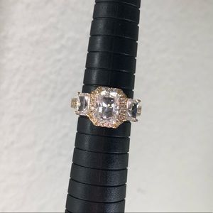 Gold emerald cut 3 stone Halo sterling silver ring